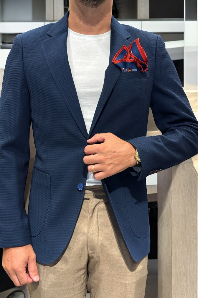 Giacca nido d’ape blu