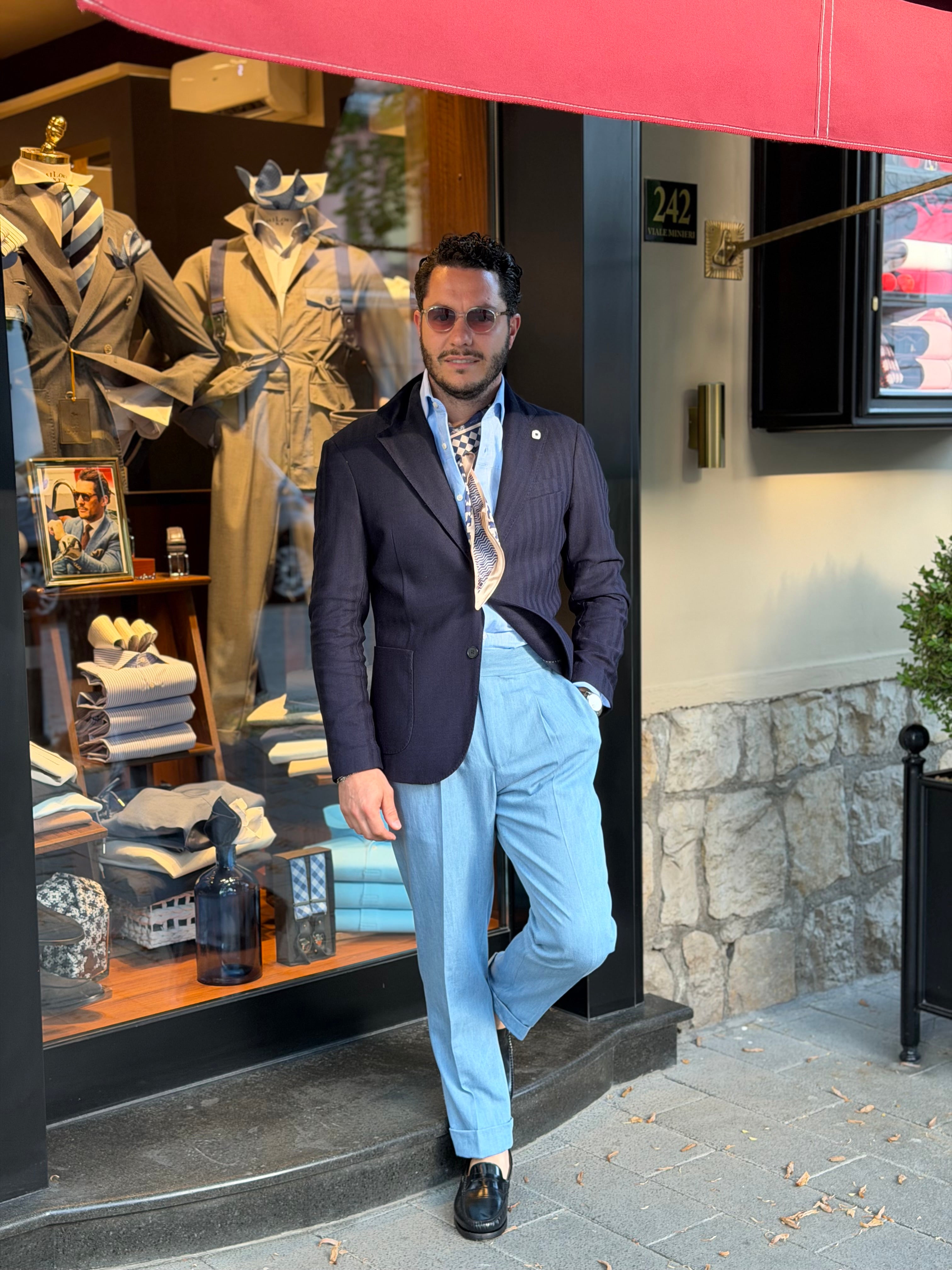 Jeans vita alta con regolatori