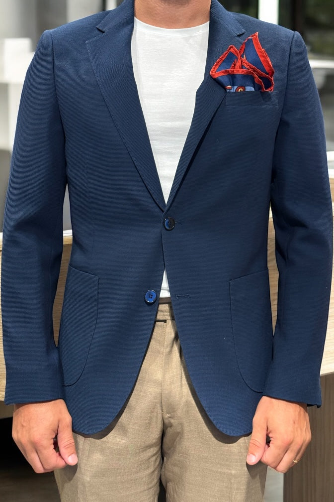 Giacca nido d’ape blu