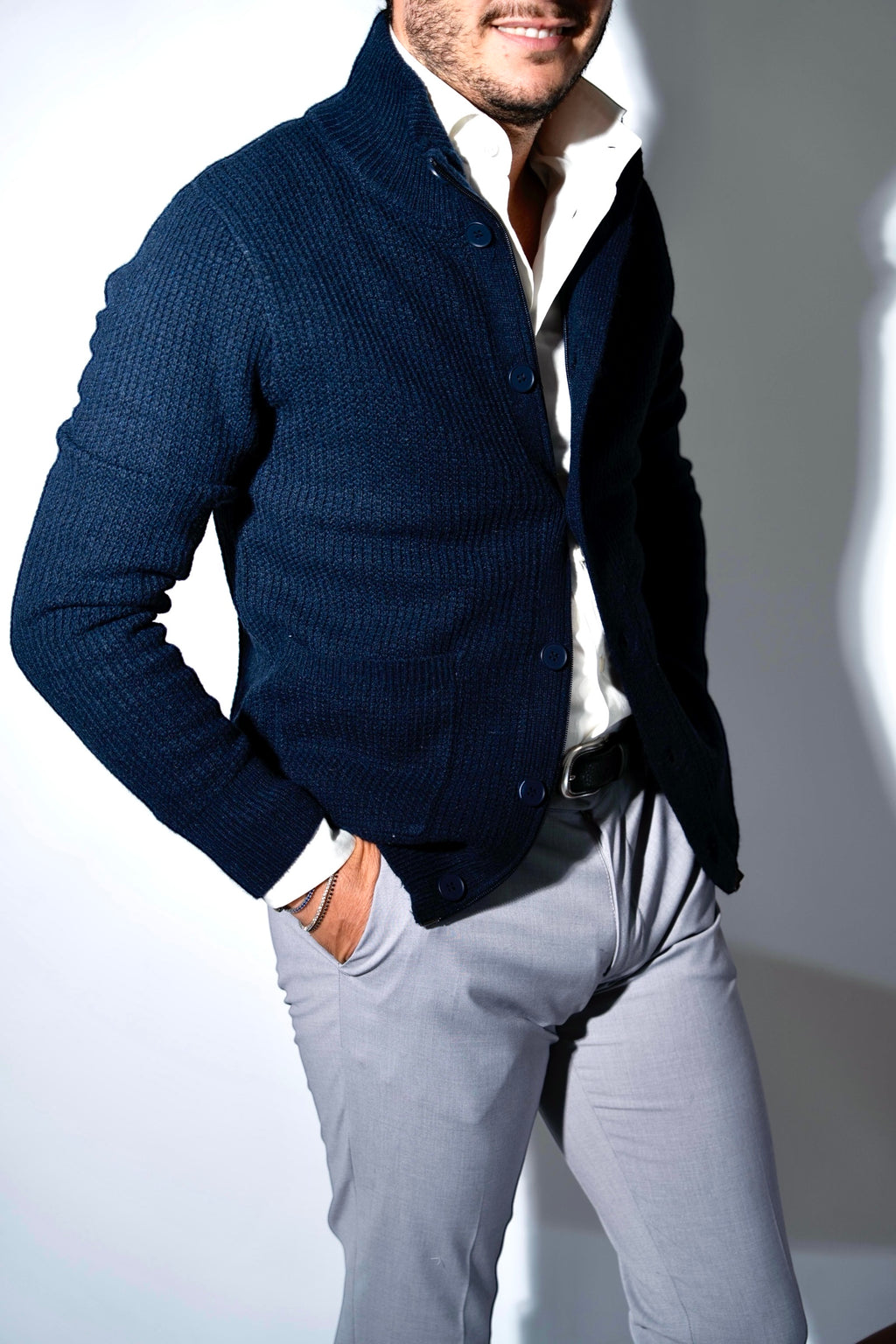 Cardigan coste con tasche