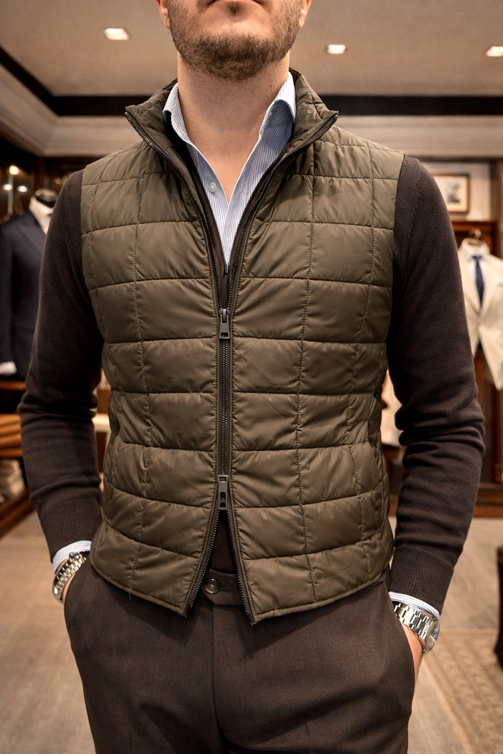 Piumino smanicato verde