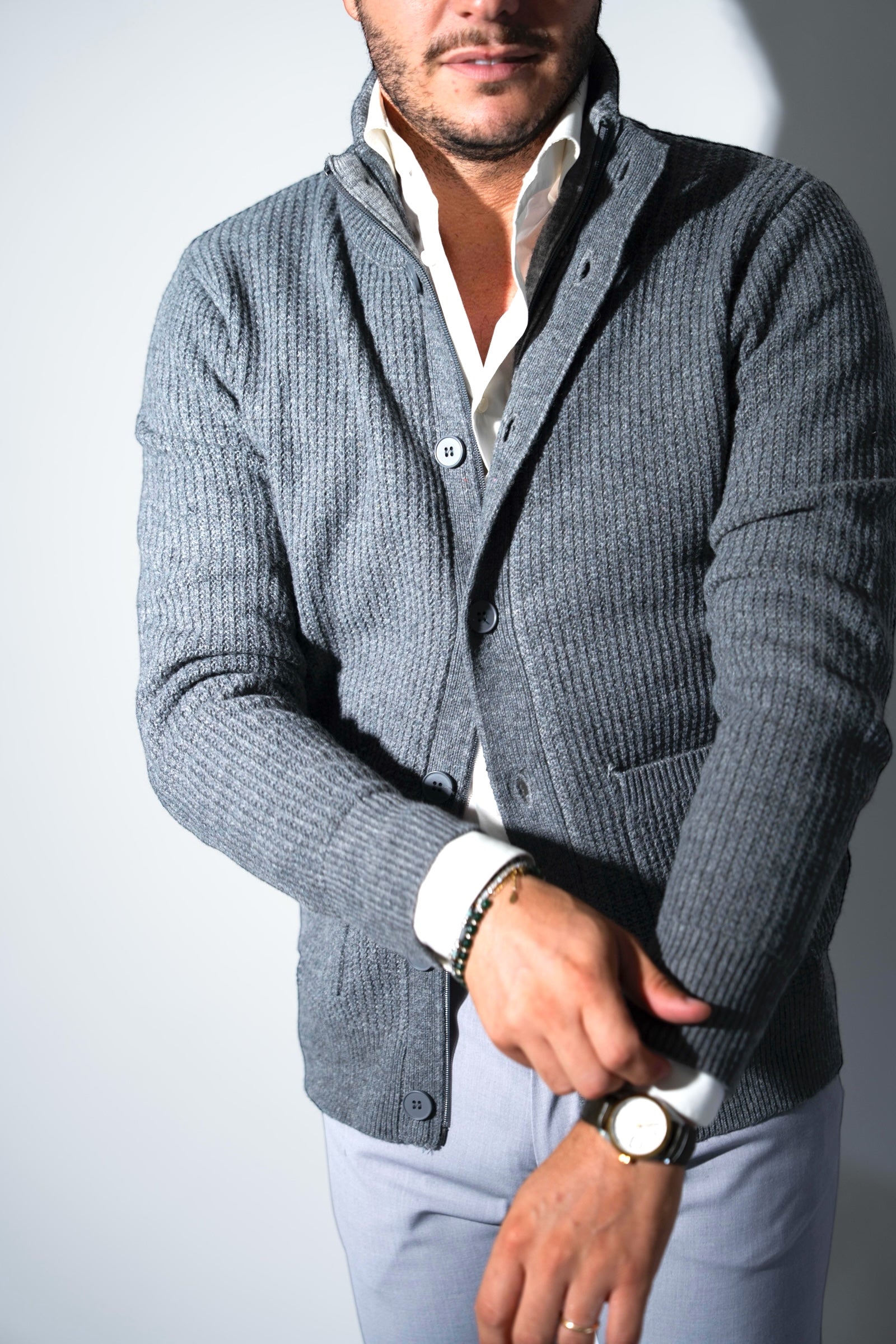 Cardigan coste con tasche