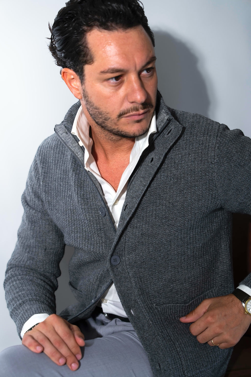 Cardigan coste con tasche