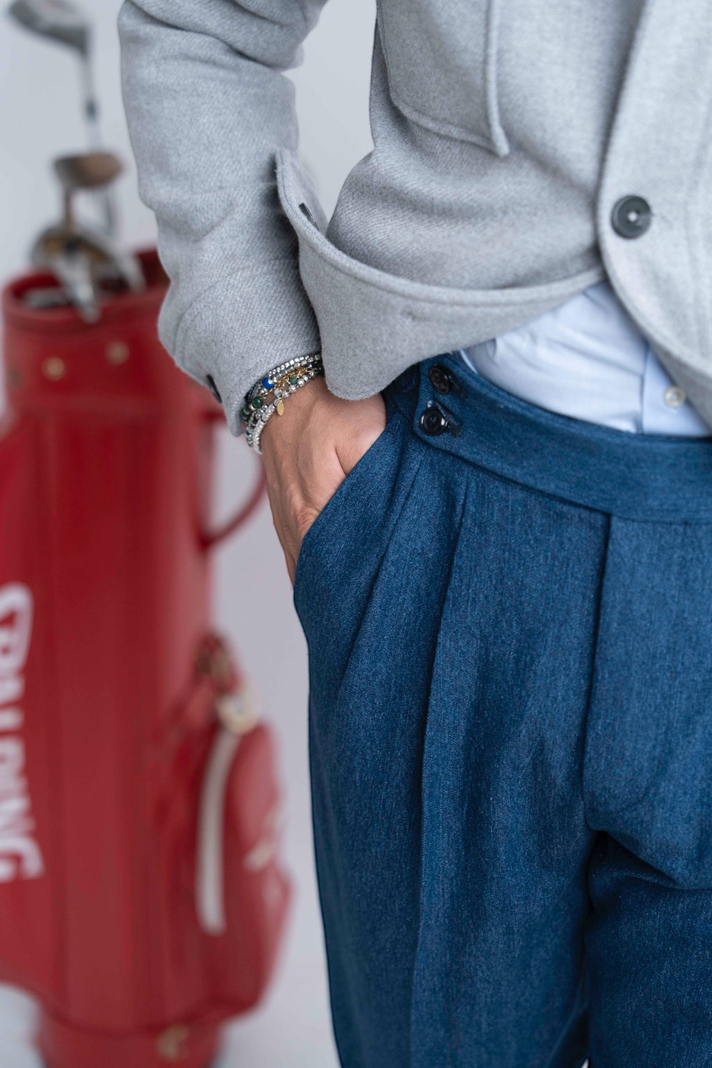 Jeans vita alta con regolatori celeste